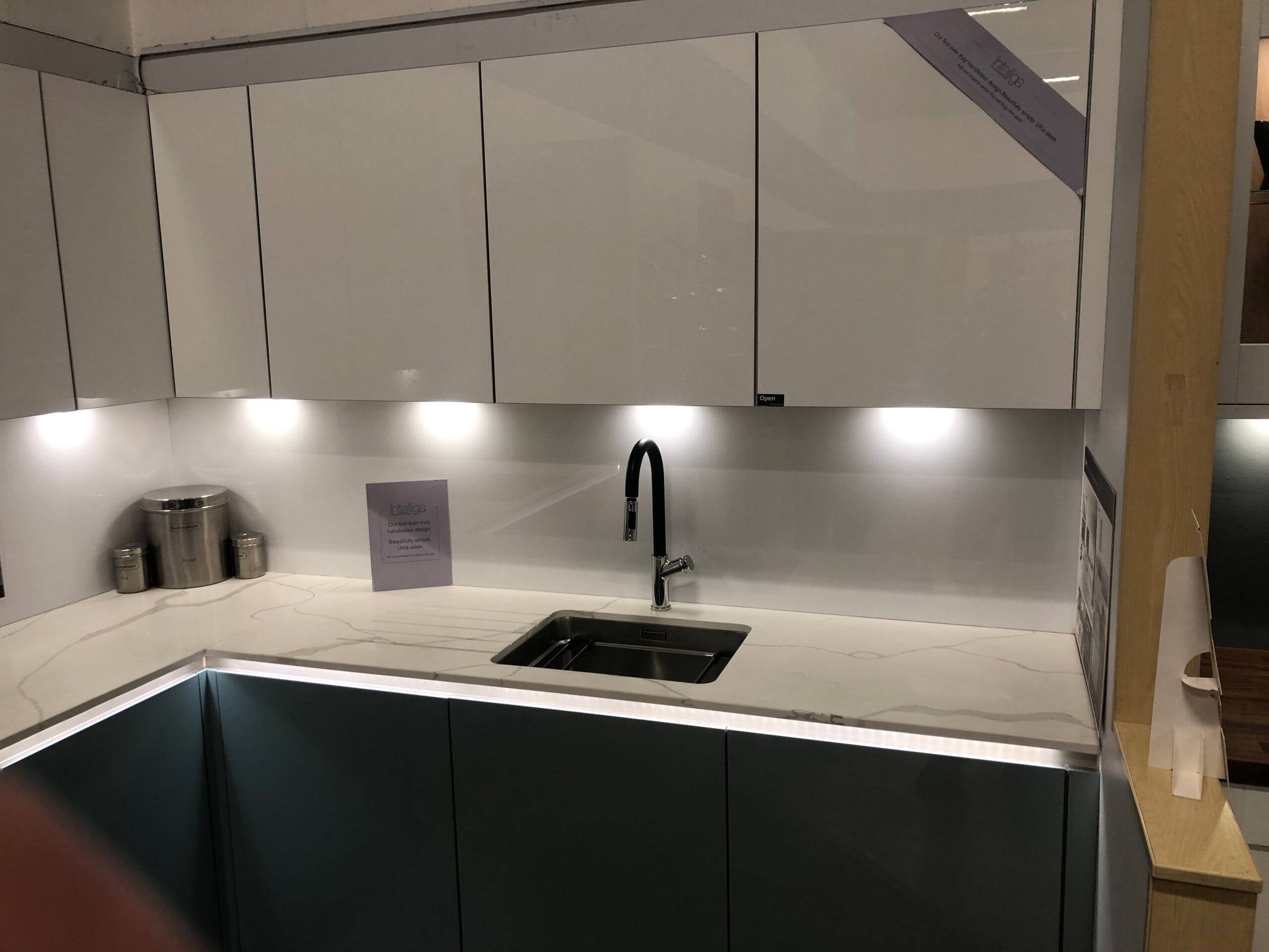 Modern black kitchen sink after blockage clearance