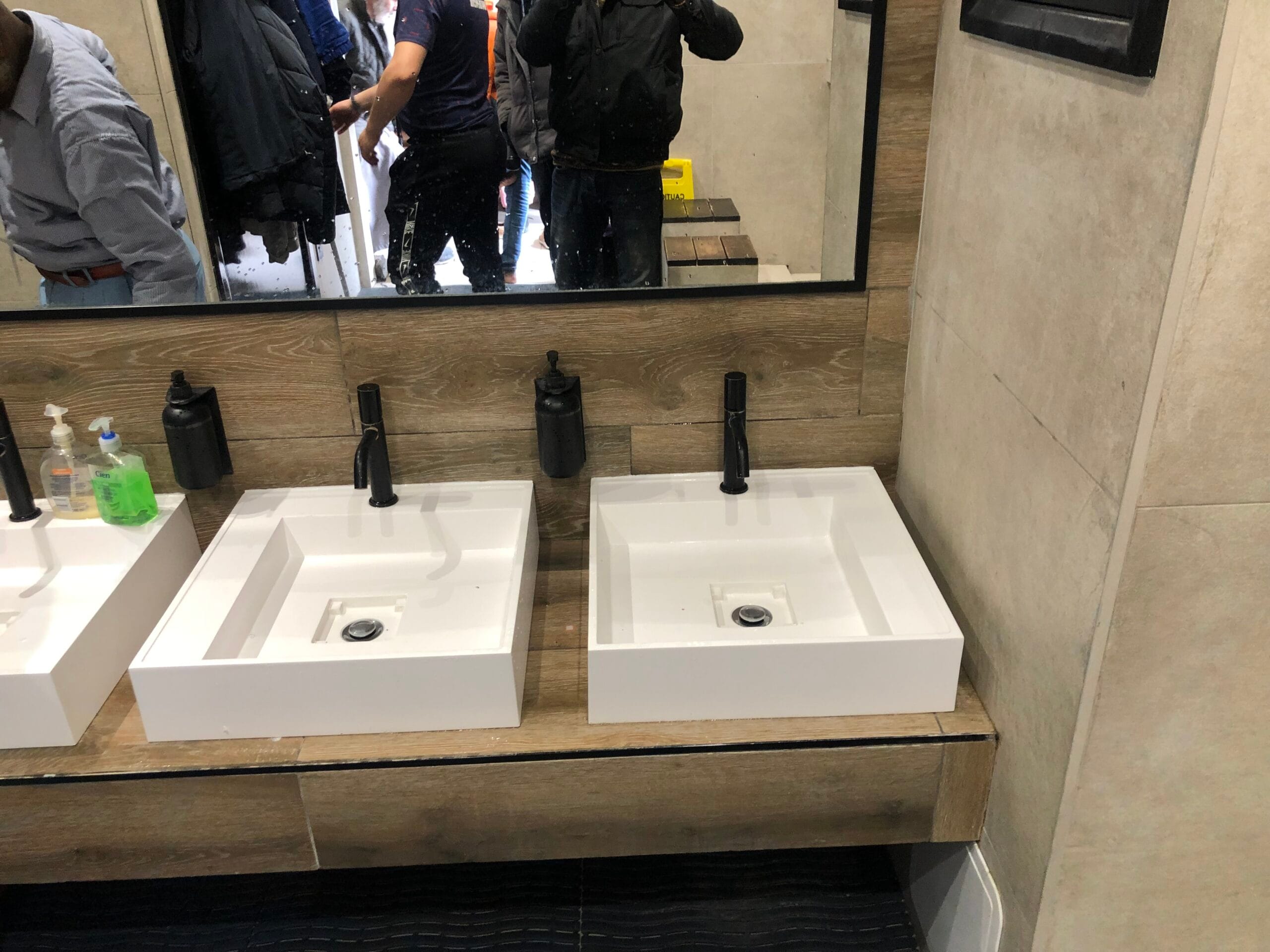 Double bathroom sinks inspected for blockages